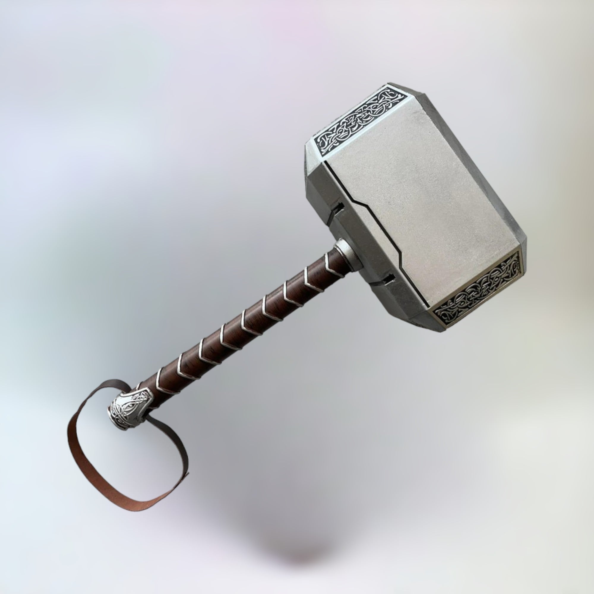 Thor's Hammer toy replica, made of rubber and plastic, with a total height of 44cm and a handle height of 30cm, displayed against a plain background