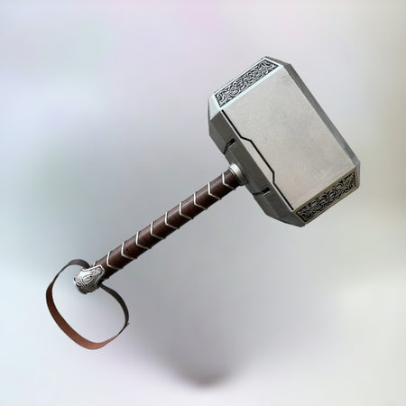 Thor's Hammer toy replica, made of rubber and plastic, with a total height of 44cm and a handle height of 30cm, displayed against a plain background